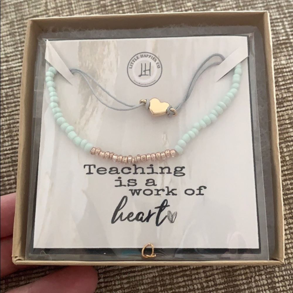 2 little bracelets ‘Teaching is a work if heart’